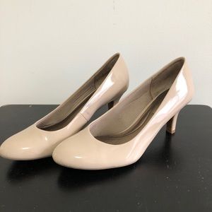 Nude, patent pumps.